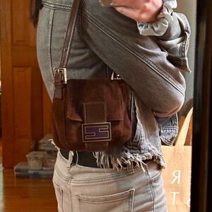 Fendi Baguette Mini Shoulder Bag with brown leather strap.